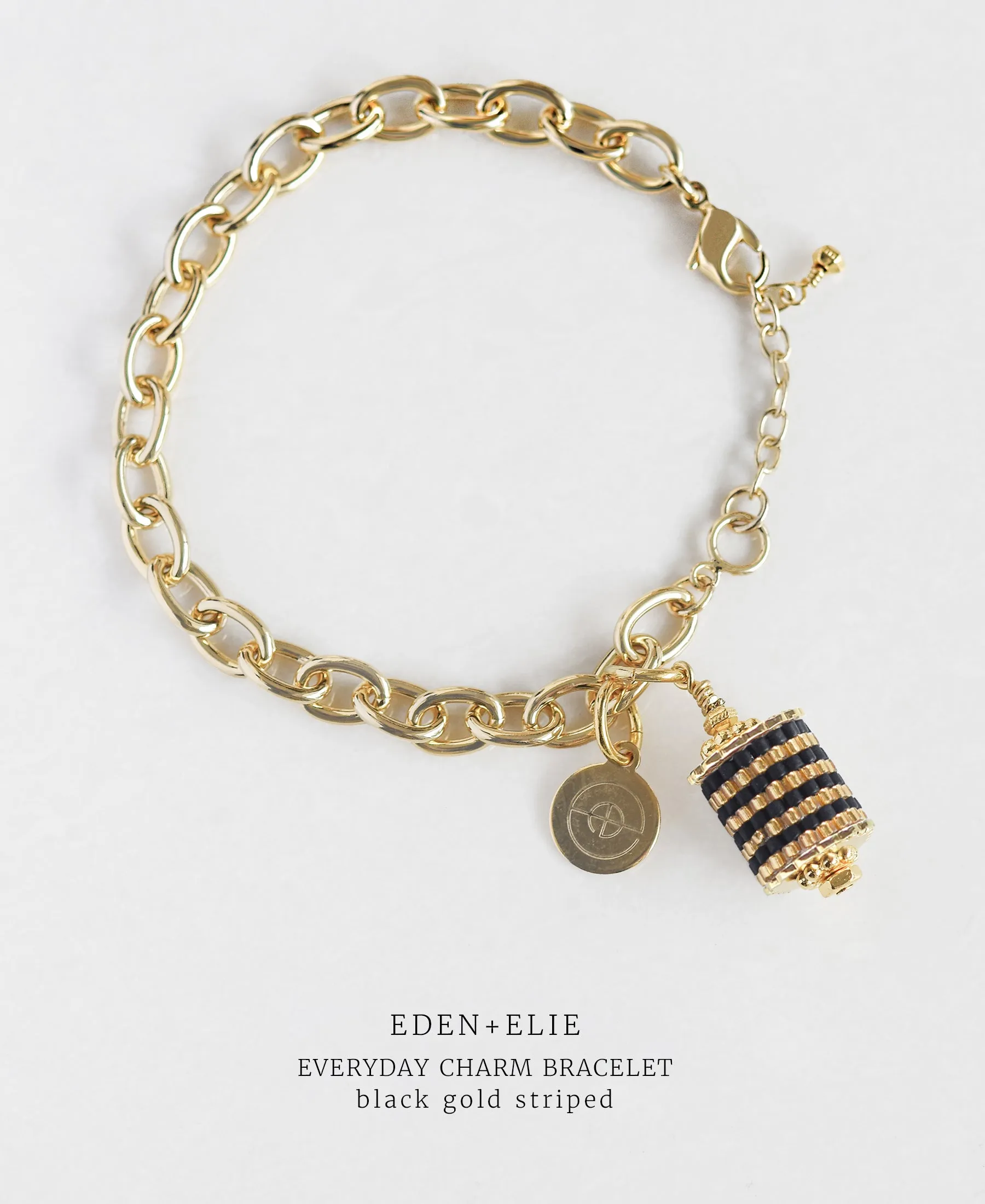 EDEN   ELIE Everyday gold charm bracelet - black gold striped